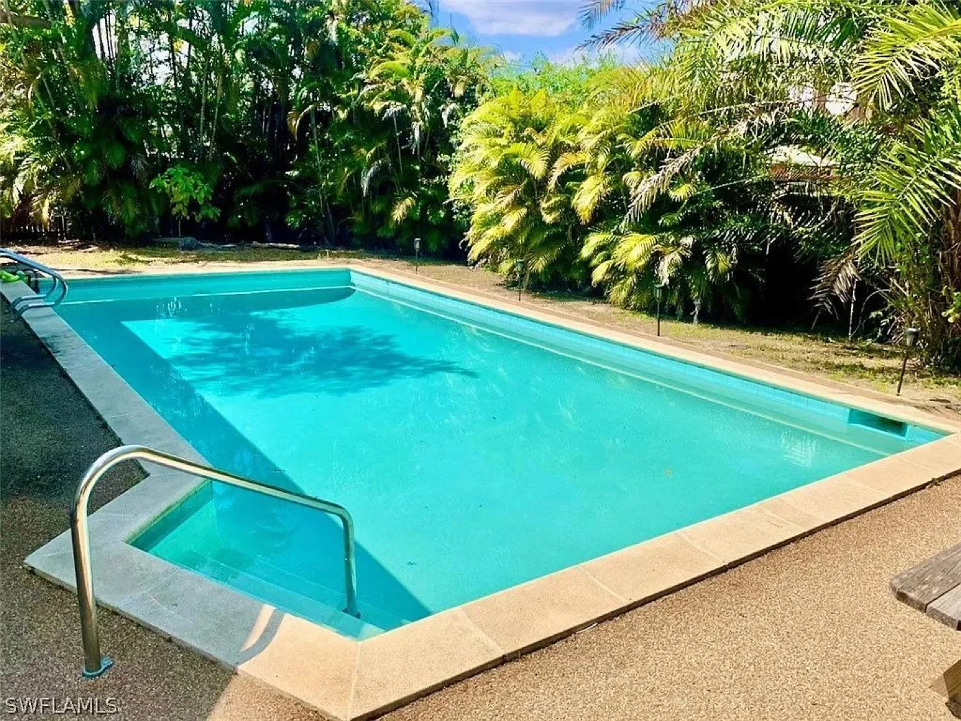Before: aged aqua finish, narrow concrete deck and worn coping